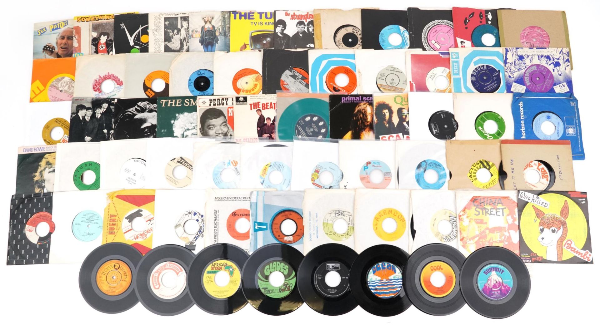 45rpm records including Scandal, The Beatles and David Bowie