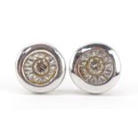 Pair of 9ct white gold diamond solitaire stud earrings, each 5.5mm in diameter, total 0.9g