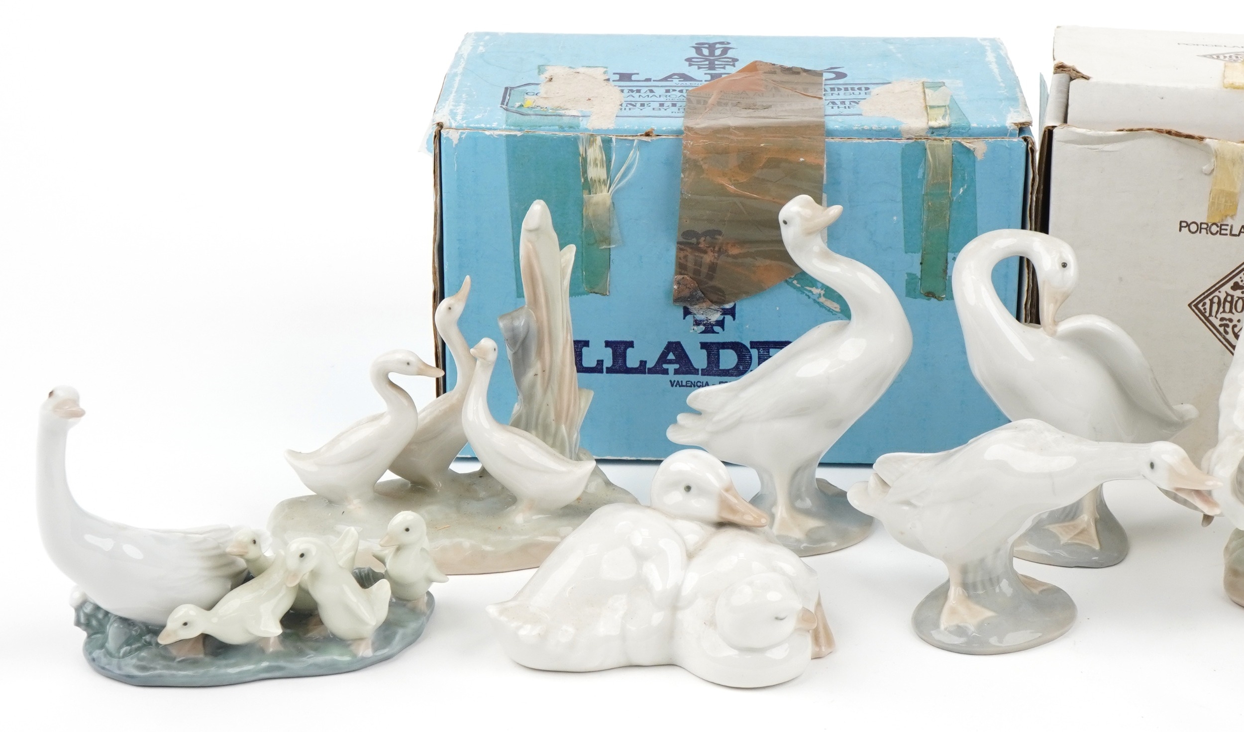 Nine Lladro and Nao figures, animals and groups including two polar bears and a boy with ram, the - Image 2 of 3