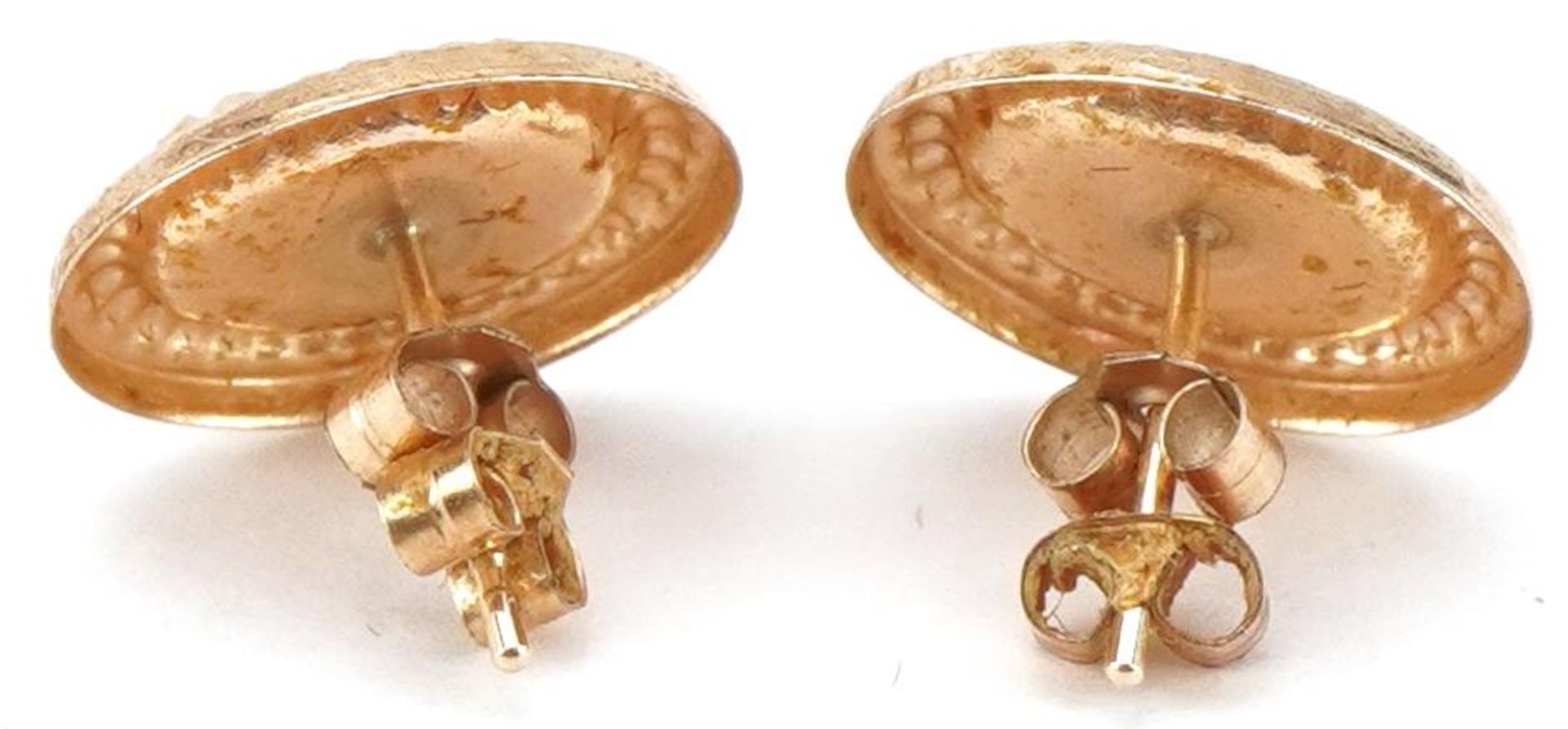 Pair of yellow metal cameo style stud earrings decorated with maiden heads, each 11.5mm high, - Image 2 of 2