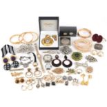Vintage and later costume jewellery and wristwatches including a Napier Green Man brooch,