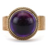 Modernist unmarked gold cabochon amethyst ring, tests as 9ct gold, size K, 8.0g
