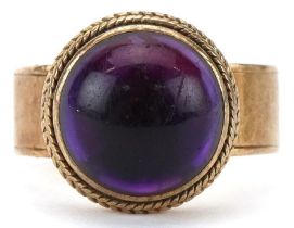 Modernist unmarked gold cabochon amethyst ring, tests as 9ct gold, size K, 8.0g