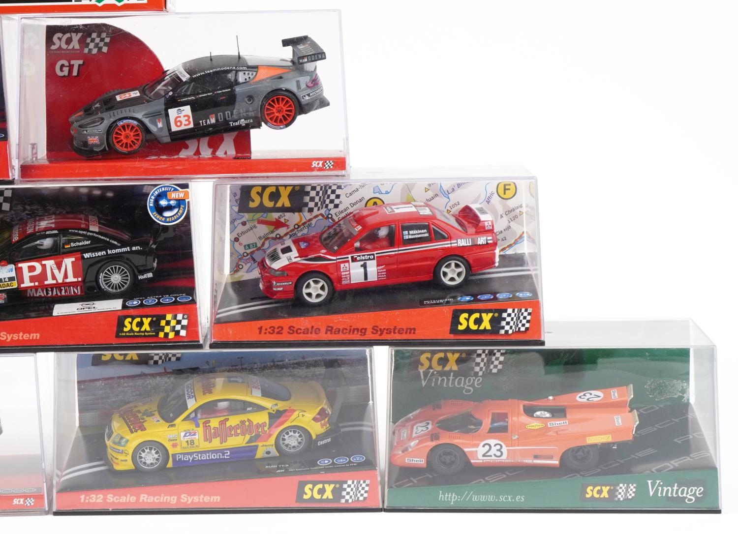Ten Matchbox SCX 1:32 scale model slot cars with cases including Skoda Octavia WRC, Opel Astra V8 - Image 3 of 3