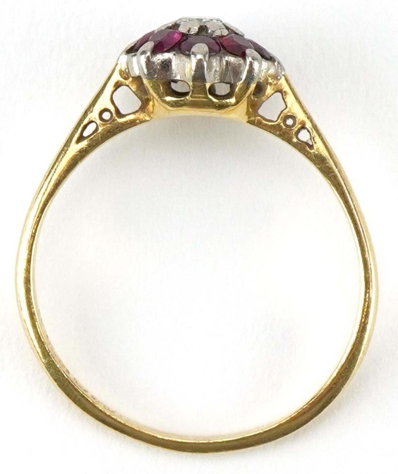 18ct gold diamond and ruby flower head ring, the diamond approximately 0.10 carat, size N, 2.6g - Bild 3 aus 4