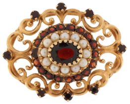 10ct gold Bohemian garnet and seed pearl openwork brooch, 3.2cm wide, 8.5g