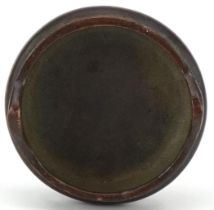 Chinese patinated bronze tripod censer with twin handles, 5.2cm in diameter