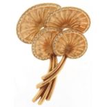 Christian Dior, gold plated and clear stone brooch in the form of palm leaves, 6.5cm high, 30.0g