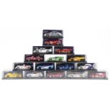 Sixteen Fly 1:32 scale model slot cars with cases including Lister Storm, Dodge Viper GTS-R and