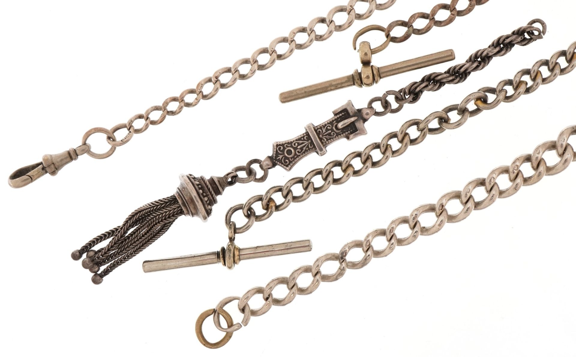 Three silver and white metal watch chains and a Victorian unmarked silver buckle design tassel,