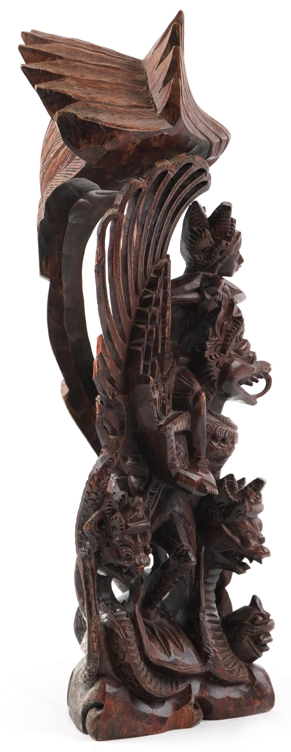 Large Burmese hardwood carving of a deity and mythical animals, 56cm high - Image 4 of 6