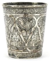 Islamic silver beaker profusely engraved with figures, impressed marks to the base, 8cm high, 84.2g