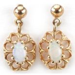 Pair of 9ct gold opal flower head drop earrings, each 1.6cm high, total 1.1g