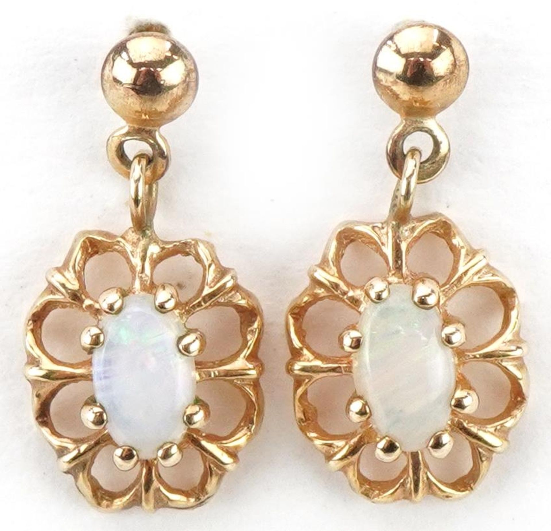 Pair of 9ct gold opal flower head drop earrings, each 1.6cm high, total 1.1g