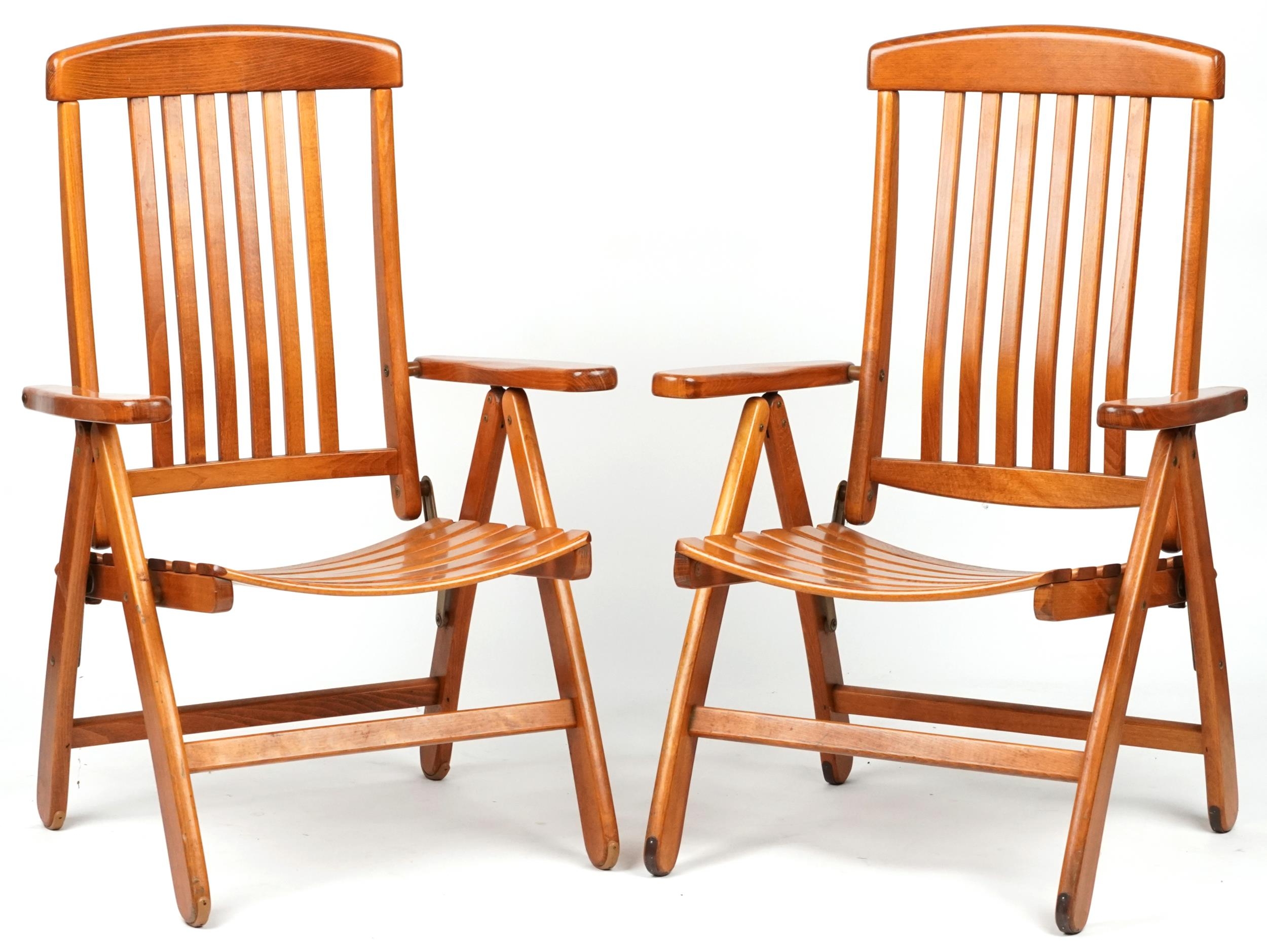 Herlag, pair of West German teak folding chairs, each 102cm high
