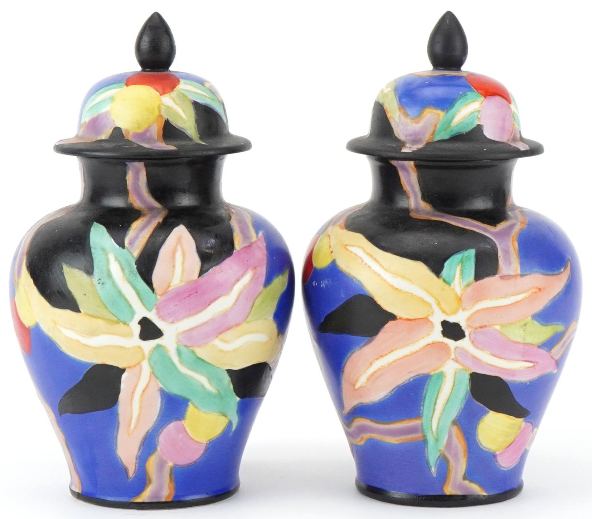 Pair of Carlton Ware hand painted Handcraft ginger jars and covers, paper label to base, each 20cm