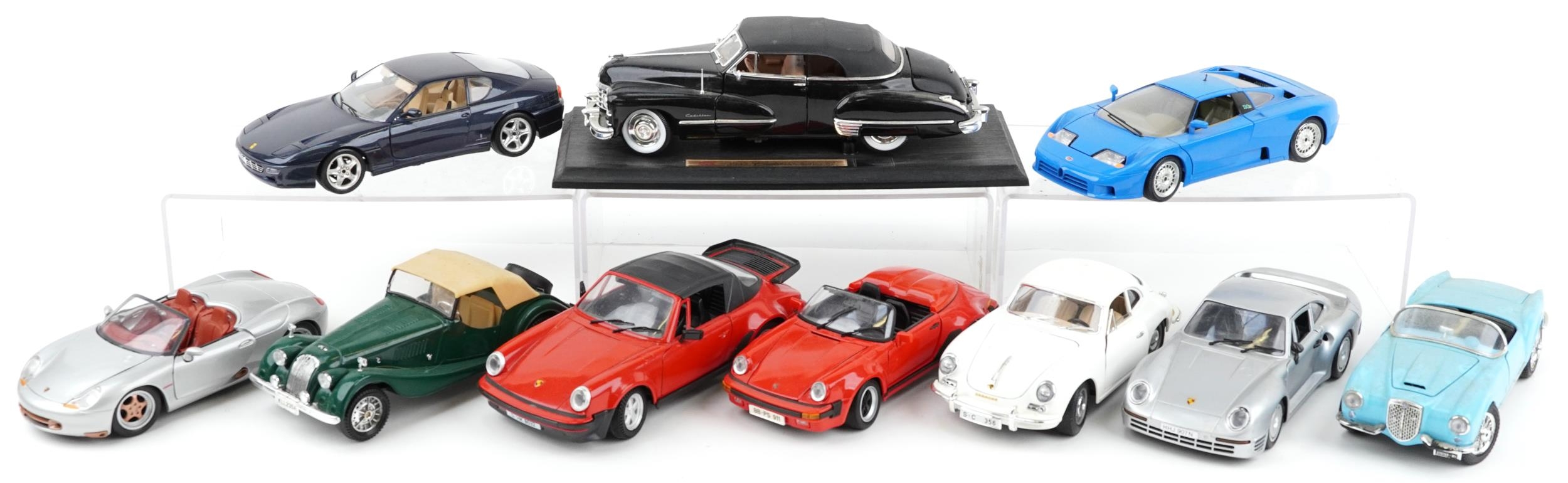 Ten 1:18 scale diecast vehicles including Burago Ferrari 456GT 1992, Maisto Porsche 911 Speedster