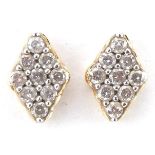 Pair of 10ct gold diamond marquis stud earrings, each 8.0mm high, total 1.1g