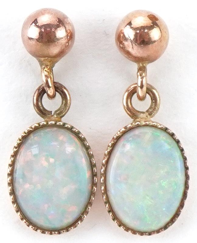 Pair of 9ct gold opal drop earrings, each 1.7cm high, total 1.4g