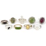 Nine silver, silver gilt and white metal rings, some set with semi precious stones, including