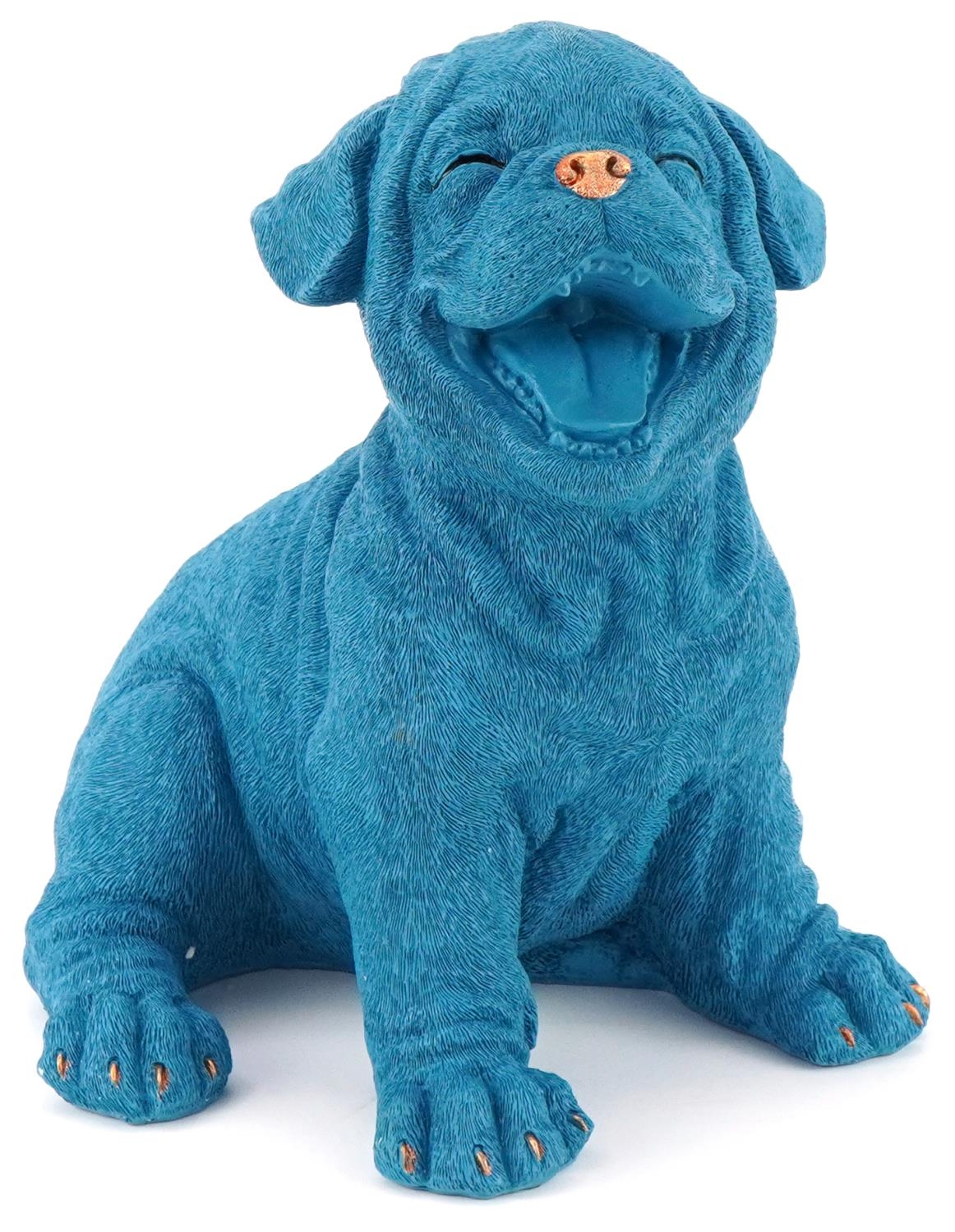 Novelty blue painted model of a comical happy dog, 27cm high