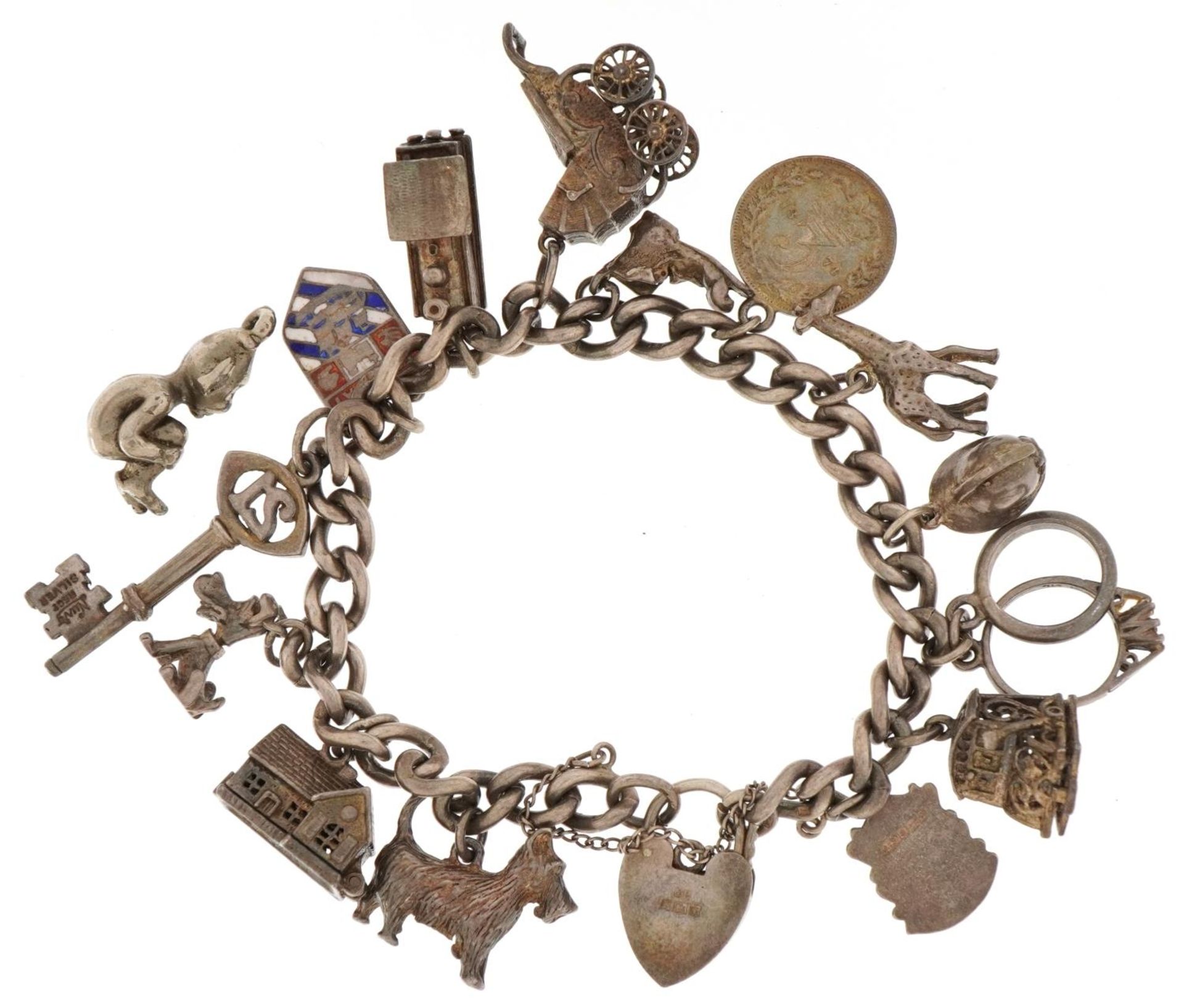 Silver charm bracelet with a collection of mostly silver charms, 57.6g - Image 2 of 3