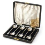 A J Bailey, set of six George VI silver coffee bean spoons housed in a velvet and silk lined