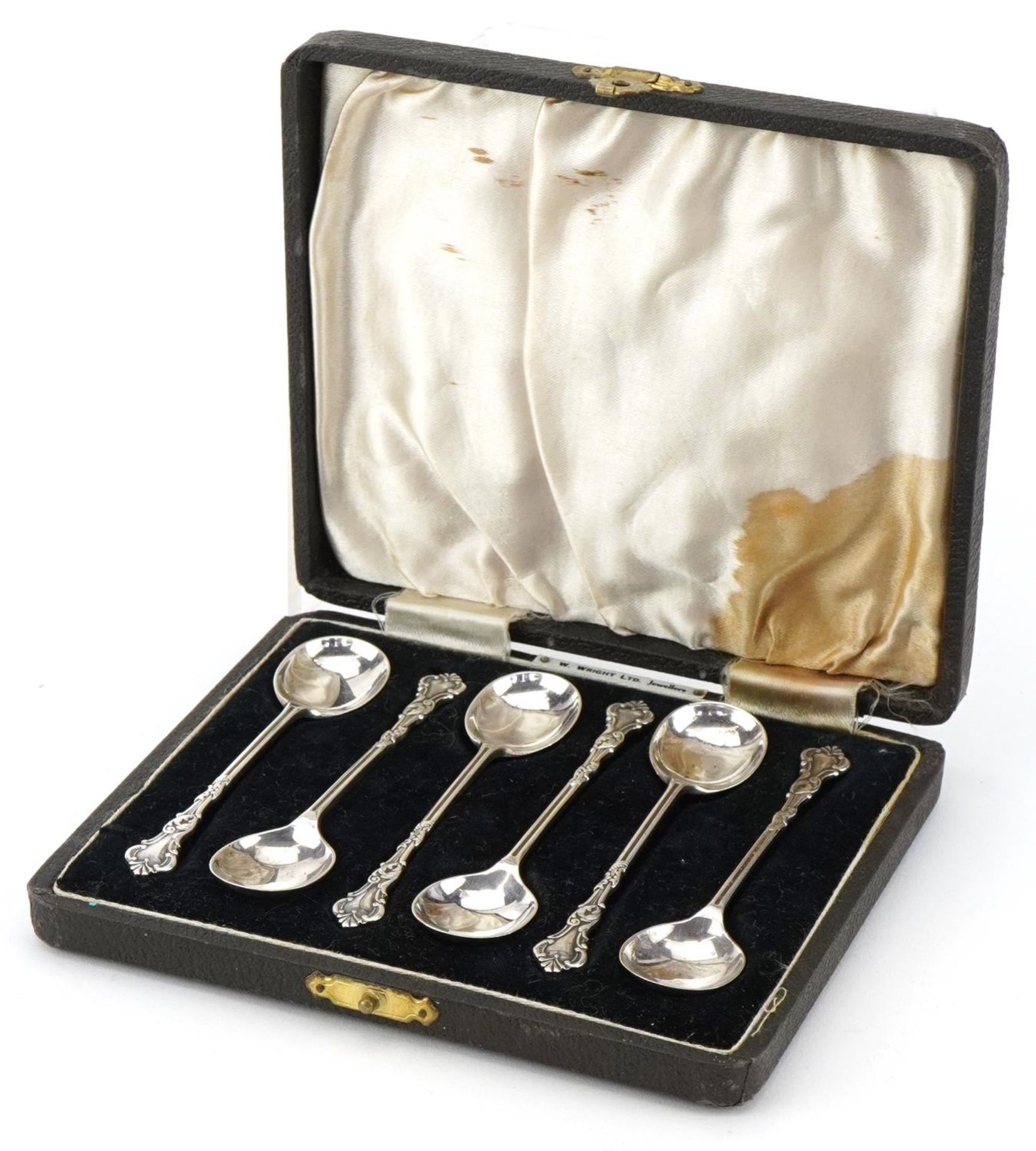 A J Bailey, set of six George VI silver coffee bean spoons housed in a velvet and silk lined