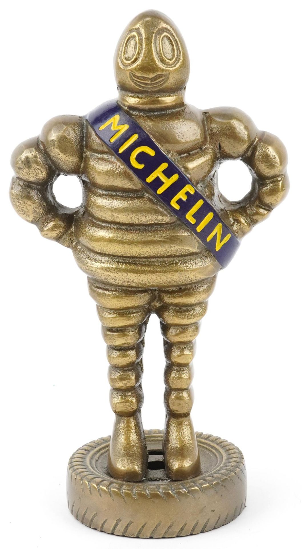 Gilt painted metal advertising figure of a Michelin Man, 28cm high