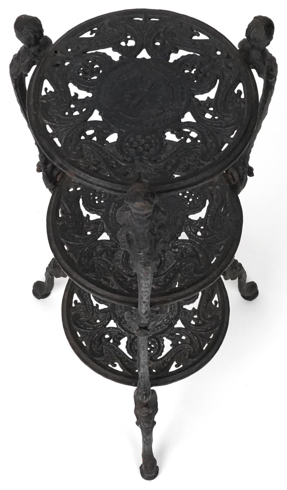 Victorian style cast iron three tier plant stand with figural mounts, 74cm high - Image 4 of 6