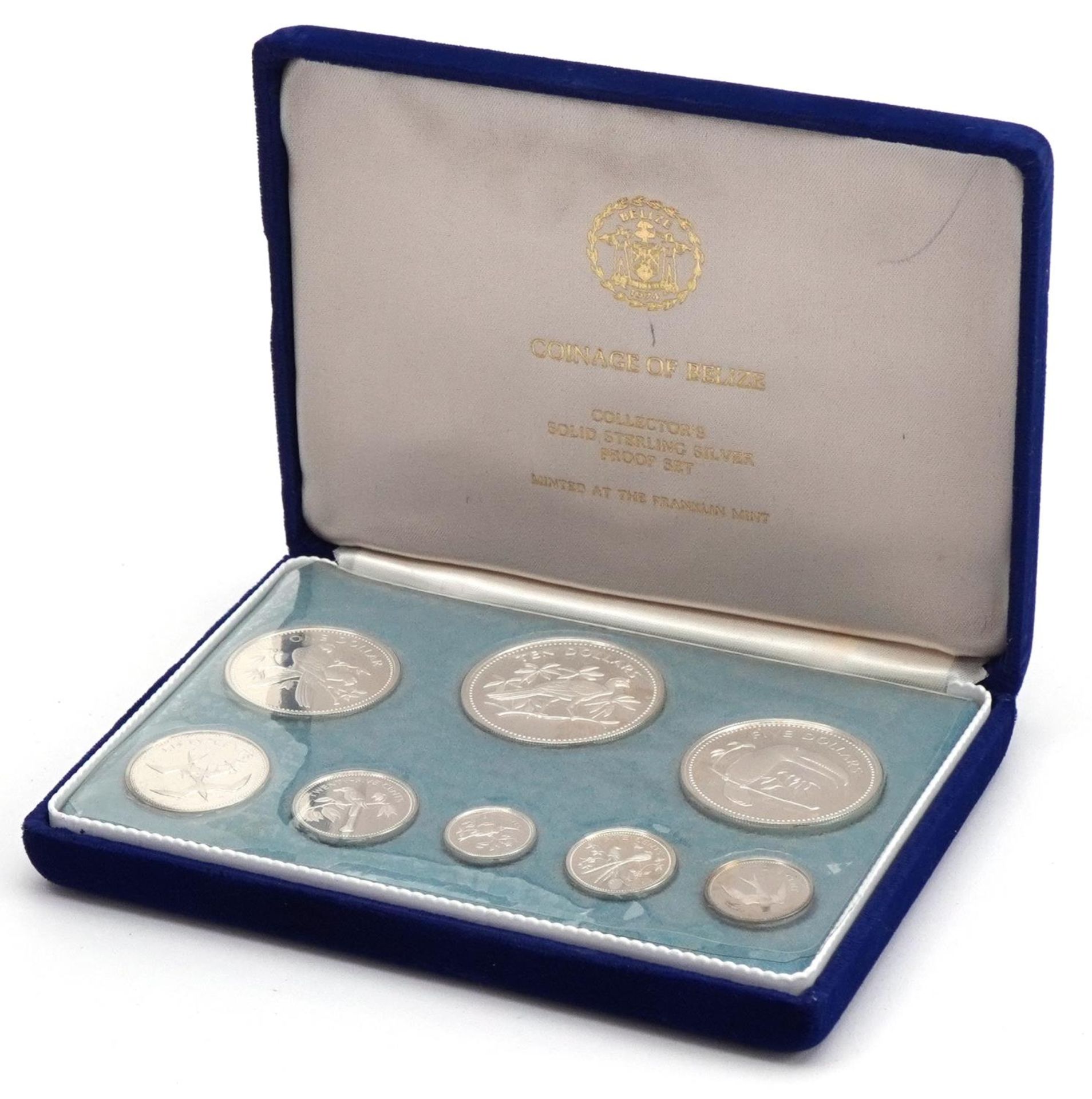 1974 Coinage of Belize silver proof eight coin set minted at The Franklin Mint, housed in a silk and