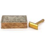 Early 20th century Gillette gilt metal razor housed in a velvet lined fitted case, the case 10.5cm