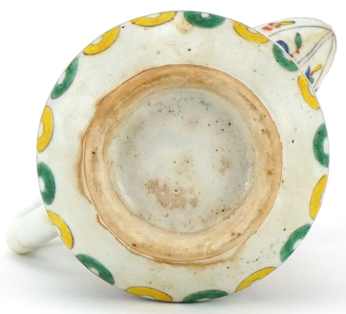 Turkish Ottoman Kutahya milk jug hand painted with stylised flowers, 11cm high - Image 3 of 3