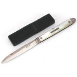 George III mother of pearl flanked silver folding fruit knife housed in a tooled leather case,