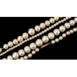 Two graduated simulated pearl necklaces with 9ct gold and silver clasps, 60cm and 44cm in length,