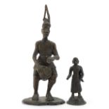 Bronze figure of an Indian god together with a bronze African statue of a drumming man, the
