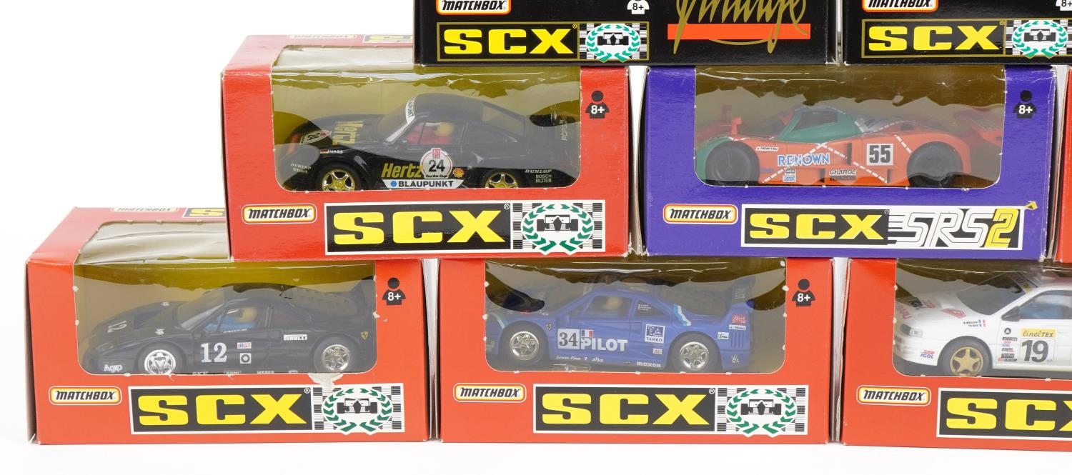 Ten Matchbox SCX 1:32 scale model slot cars with boxes and cases including Subaru Impreza, Porsche - Image 3 of 4