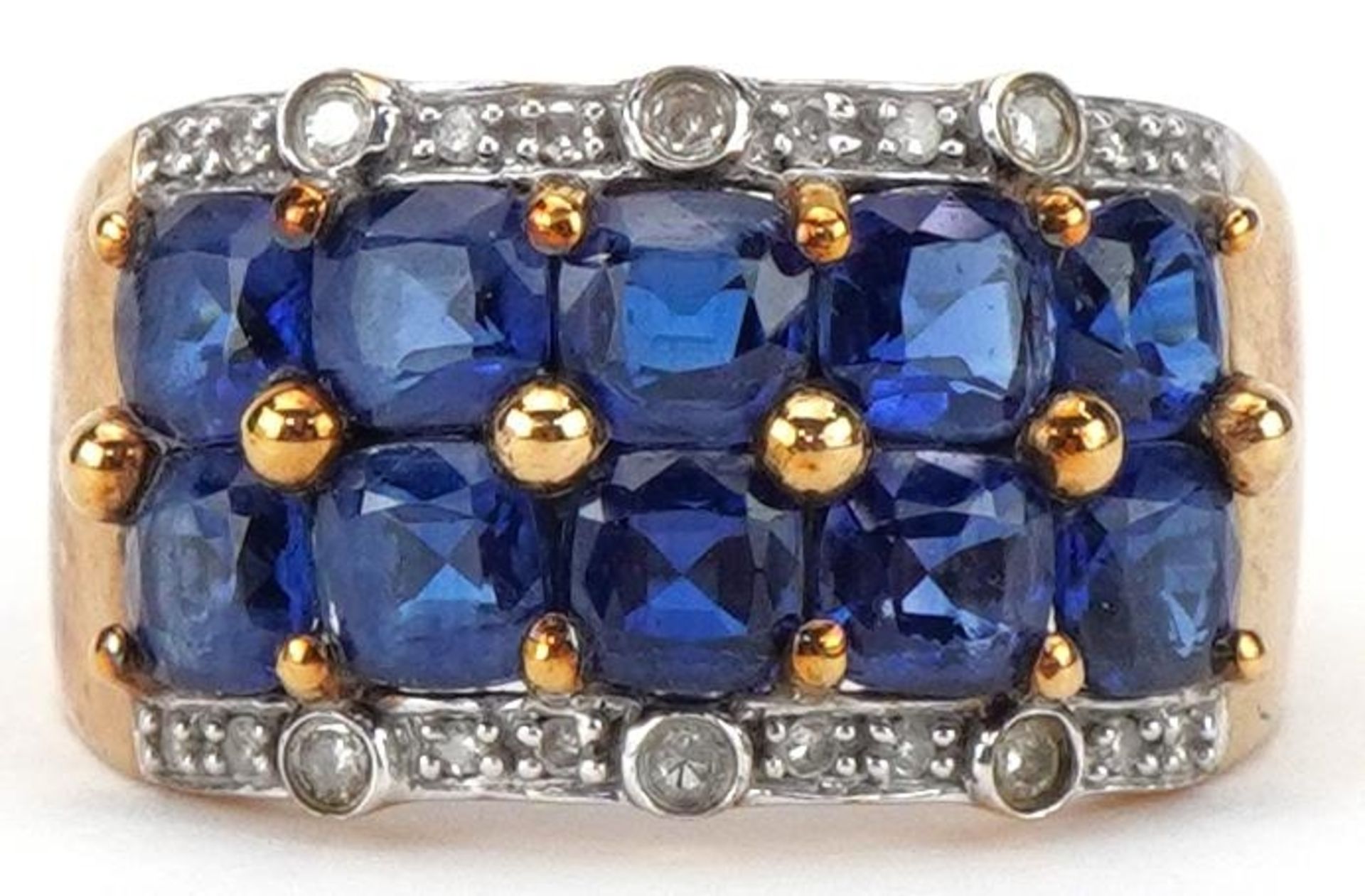 9ct gold blue spinel and diamond four row cluster ring, size P, 4.4g