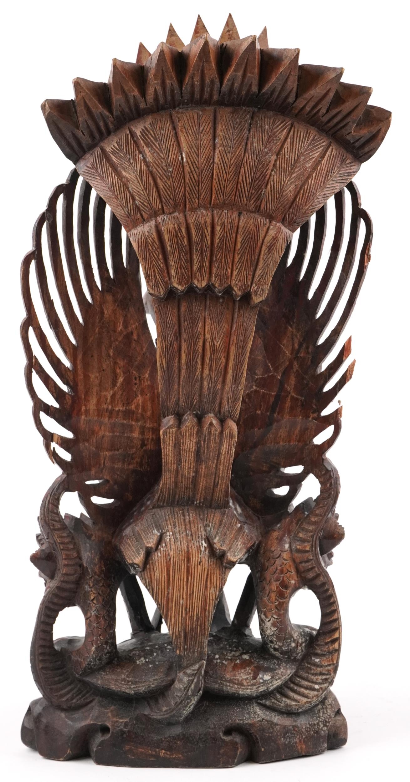 Large Burmese hardwood carving of a deity and mythical animals, 56cm high - Image 3 of 6