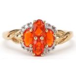 9ct gold orange stone and diamond cluster ring, possibly fire opal, size P, 2.1g