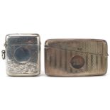 Victorian silver engine turned card case and a George V silver floral engraved vesta, the largest