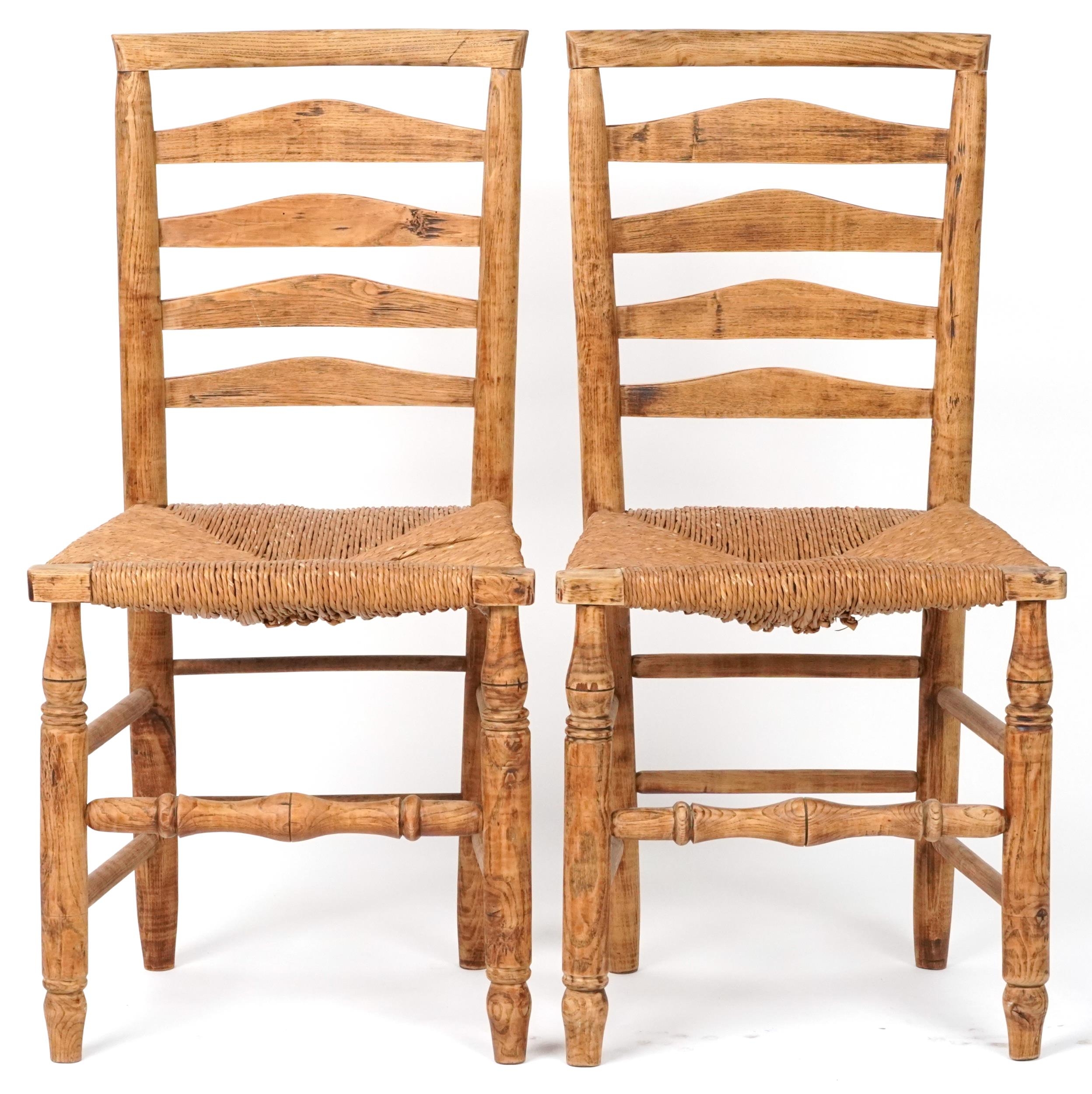 Pair of beech ladderback chairs with cane seats, each 93cm high - Image 2 of 4