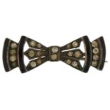 Art Deco unmarked silver, black enamel and clear stone brooch in the form of a bow, 3cm wide, 4.2g