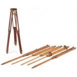 Edwardian mahogany and brass folding camera tripods