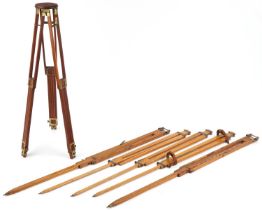 Edwardian mahogany and brass folding camera tripods