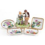 Dresden, German porcelain including a summer figure group of a young boy and girl holding flowers