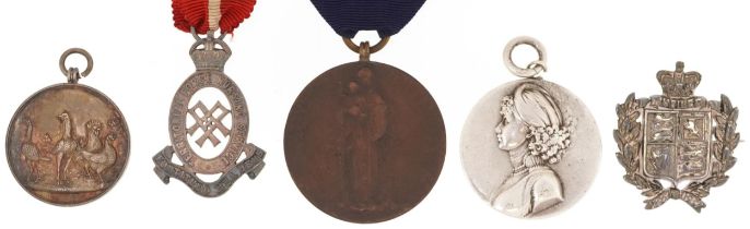 Boxed silver poultry medal and other medals and badges including a St Marylebone infirmary for Hilda