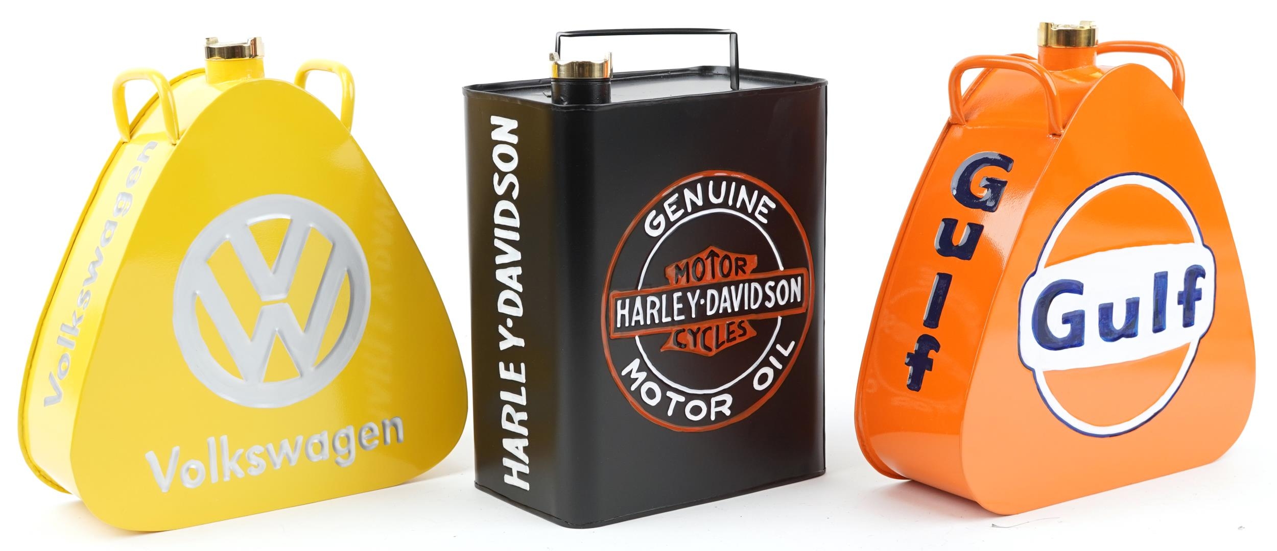 Three advertising metal fuel cans a Harley Davison, Volkswagen and Gulf, each 34cm high