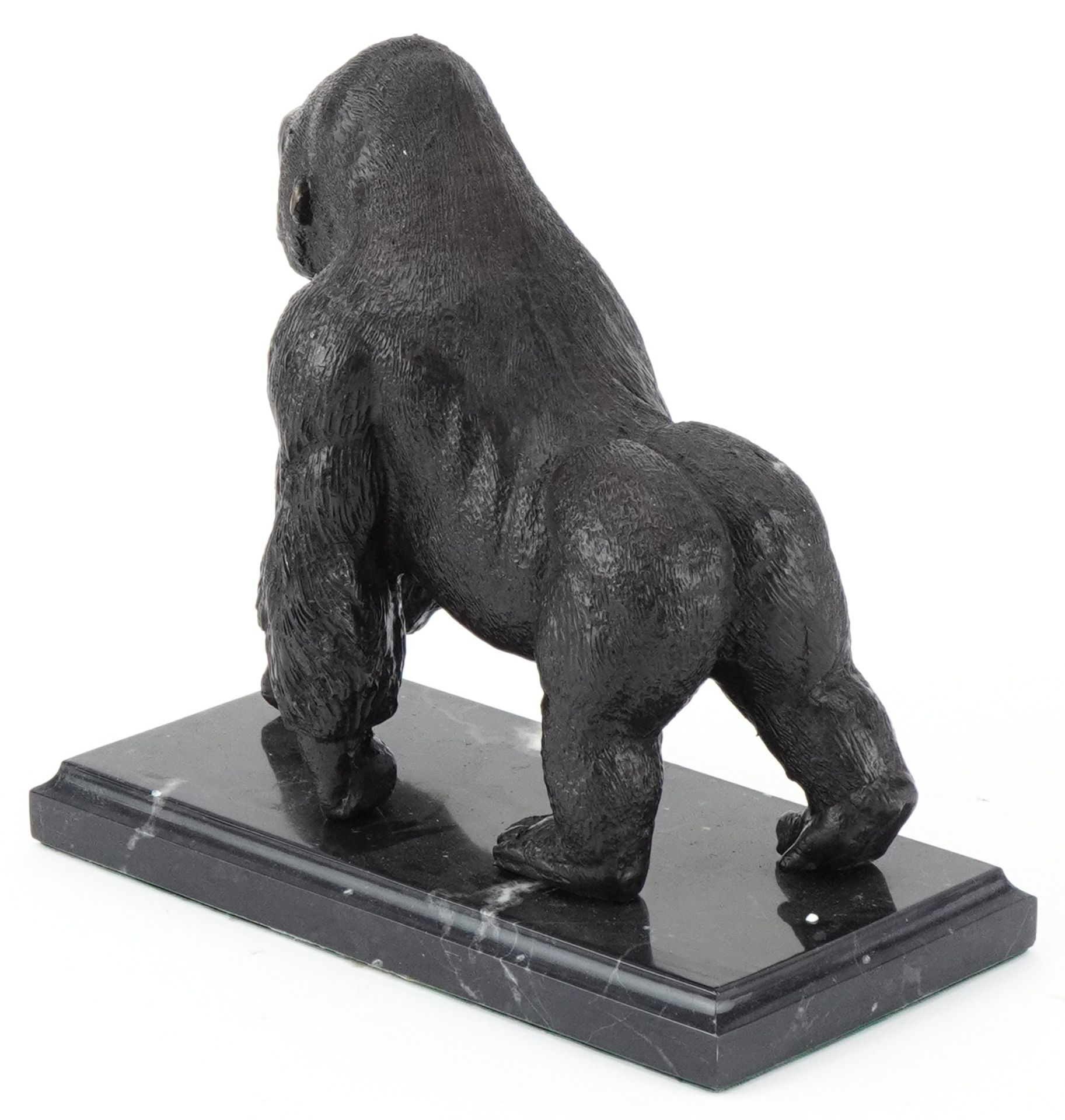 Patinated bronze study of a gorilla raised on a black marble base, 20cm in length - Image 2 of 3