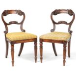 Pair of Victorian carved rosewood occasional chairs with tapestry upholstered cushioned seats on